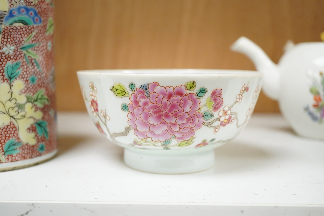 A Chinese famille rose bowl enamelled with a chicken amongst flowers, 12.5cm in diameter